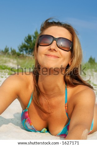 stock photo tanned sexy beach girl on caribbean sand