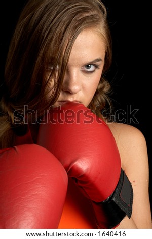 Boxing girl in orange shirt