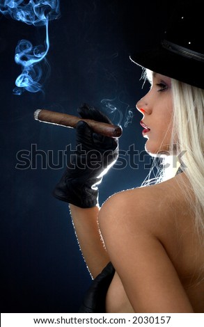 stock photo backlight image of topless girl smoking cigar