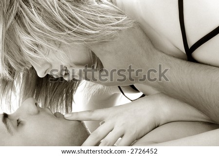 stock photo black and white image of sensual couple foreplay
