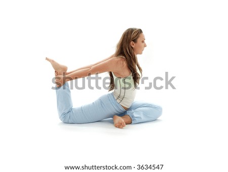 sporty girl practicing eka pada rajakapotasana one-legged king pigeon pose