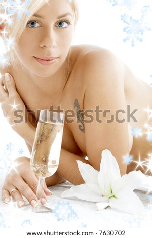 lovely topless girl with champagne glass, madonna lily and snowflakes