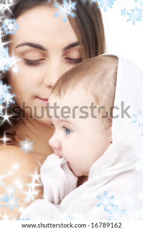 picture of happy mother with baby (focus on mother)