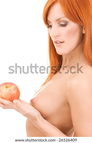 stock photo topless redhead woman with red apple over white