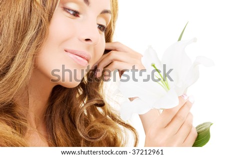 happy woman with white madonna lily flower
