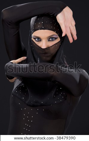 picture of ninja woman in the dark