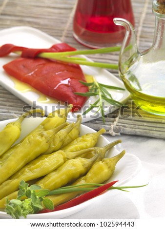 red and green peppers, served with olive oil and vinegar