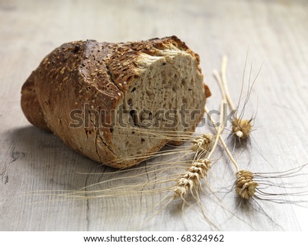 a bread made of whole grain flour on a wooden surface