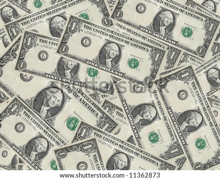 Dollar bills with serial numbers removed scattered background