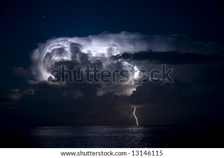 Severe thunderstorm and lightning out to sea