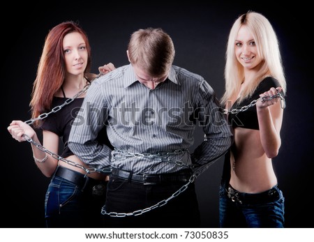 brunette and blonde guy tied a chain