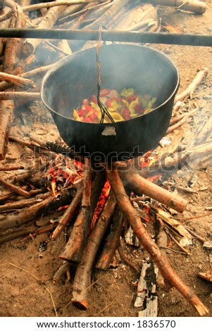camp food cooked in a cauldron