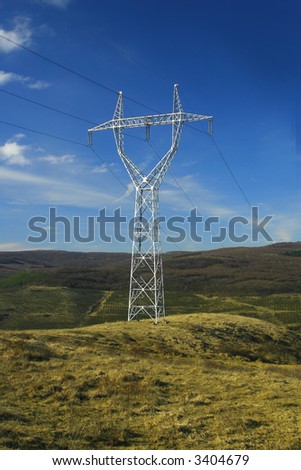 Power-lines crossing the endless hills