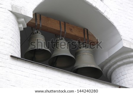 church bells, white stone church