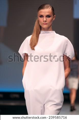 MOSCOW, RUSSIA - SEPTEMBER 03: INTERNATIONAL FASHION TRADE SHOW, Designers present their collections for spring-summer 2015 on September 03, 2014 in Moscow, Russia.