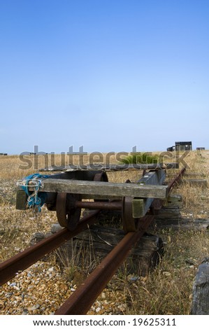 Old abandoned rail track on the beach at Dungeness