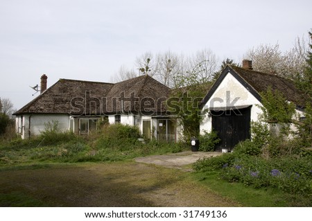 An old run-down and abandoned bungalow in the English countryside