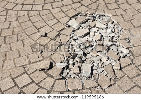Broken floor tiles