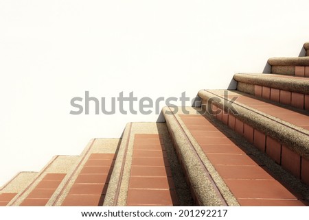 Stairway with white concrete wall