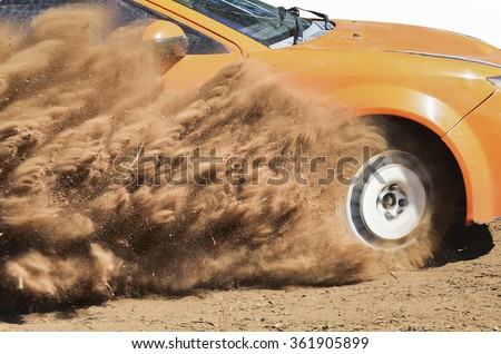 Rally car turning in track