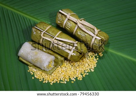 Bunch Of Thai rice and beans steamed in banana leaf