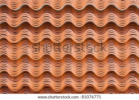 curve roof tile staked in store