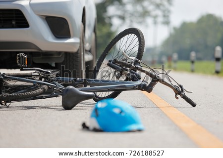 Accident car crash with bicycle on road