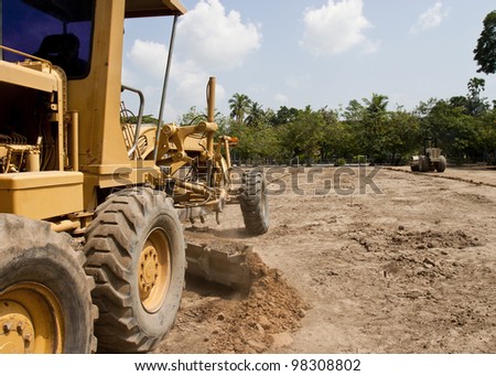 Motor grader working on road construction