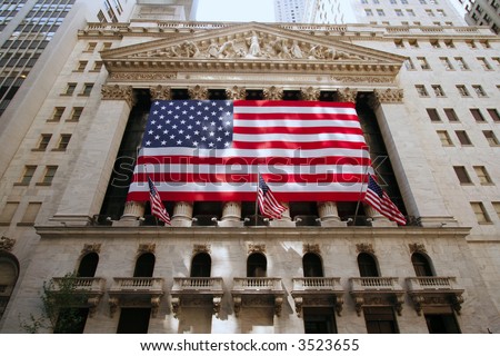 New York Stock Exchange Building draped with American flag. (Editorial Use Only)