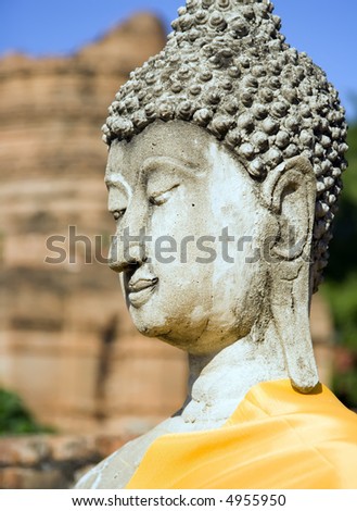 Stone Buddha at Wat Yai Chai Mongkol in Ayutthaya near Bangkok, Thailand.