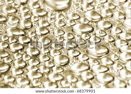 Golden Water drops background.\
See my portfolio for more