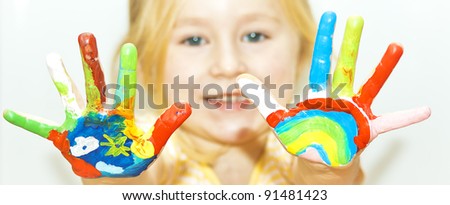 image of a little girl with hands painted,\
See my portfolio for more