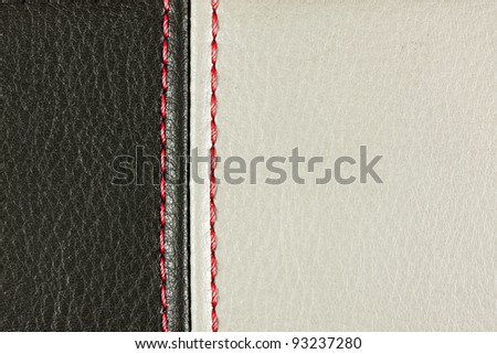 Black and Grey sewing leather with red.\
See my portfolio for more