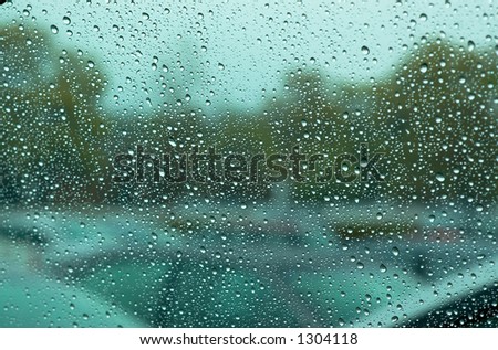 On a spring raining day, even a parking lot becomes interesting. Can also be a nice background image. This is a photo from A Raining Day Collection. Search keyword Series005 for more photos