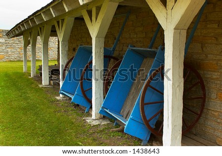 Carts next to the storage house at Fort Snelling in 1820s More with keyword Series08D.