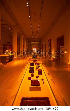 Museum-like setting with columns, spot lights & displays. More with keyword Series003