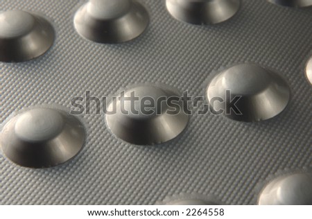 macro view of silver pills blister