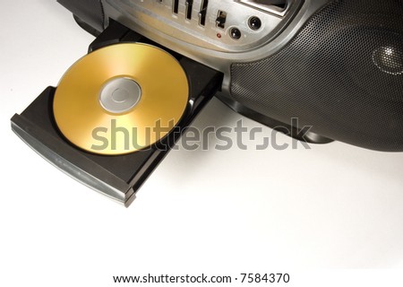 golden disk in audio equipment tray
