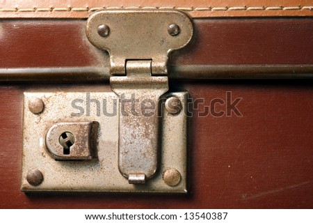 antique leather suitcase. stock photo : lock of antique leather suitcase