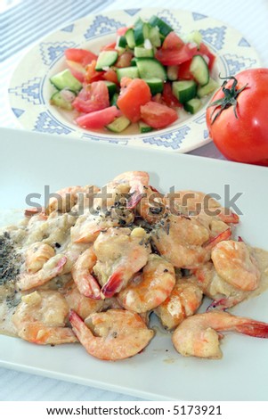 Shrimps dish with sauce & salad
