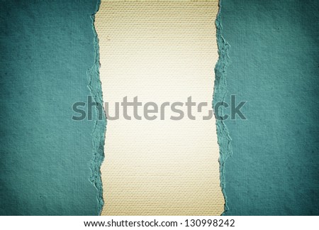 Canvas texture with vignette and ripped paper