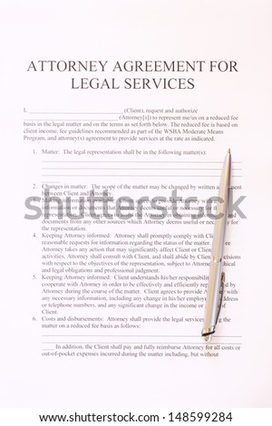 attorney agreement for legal services form and pen. top view