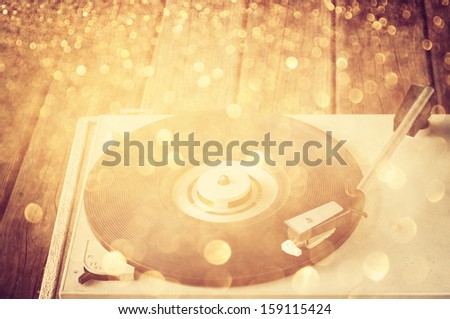 vintage record player and glitter lights