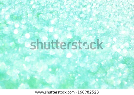 white and green pastel abstract bokeh lights. defocused background