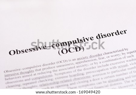 Obsessive compulsive disorder or OCD. education or healthcare concept with room for text.
