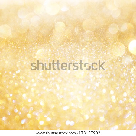 white and gold abstract bokeh lights. defocused background