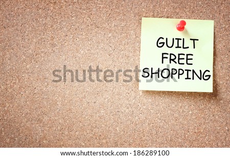 guilt free shopping concept. sticky pinned to board and room for text.