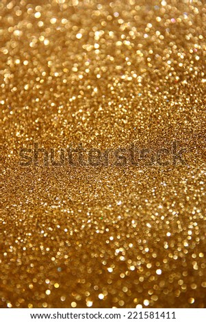 glitter vintage lights background. abstract gold background . defocused