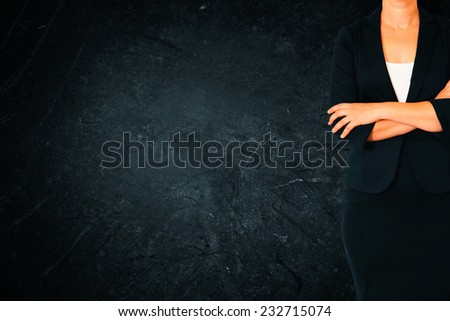 woman in business suit on black abstract elegant textured background