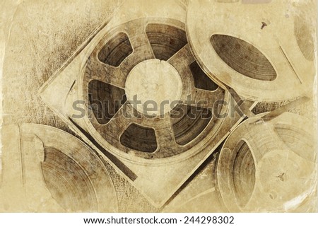 top view of old sound recording tape, reel to reel type and box. filtered image, old style photo